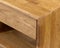 Wooden drawer of a nightstand close view photo, wooden eco furniture elements background. Solid wood furniture details