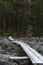 Wooden duckboard trail over rocky terrain in the evening. Finland