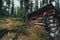 A wooden dugout shelter in the taiga
