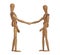 Wooden dummies shaking hands, Cooperation of business