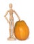 Wooden dummy with a big pumpkin