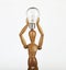 Wooden dummy with idea bulb