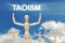 Wooden dummy puppet on sky background with text TAOISM