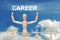 Wooden dummy puppet on sky background with word CAREER