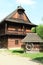 Wooden dwell with timbered city house