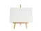 Wooden easel with blank sheet of paper