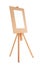 Wooden easel with blank sheet of paper on white background.