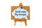 Wooden easel with corkboard and blue speech bubble with phrase S