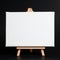 Wooden easel on a dark background.