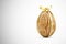 Wooden Easter Egg with Golden Bow on white gradient background with place for Your Text