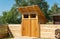 Wooden ecological toilet in the village. general sanitary unit