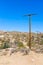 Wooden electric pole in a desert