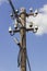 Wooden electrical pole with telephone lines