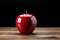 Wooden elegance artificial red apple serves as a captivating table accent