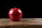 Wooden elegance artificial red apple serves as a captivating table accent