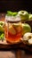 Wooden elegance Glass jar with apple jam, apples, and mint