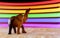 Wooden elephant with rainbow light paint on background