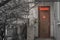 Wooden entry door on a house with reversed pentagram