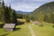 Wooden farm huts on mountain meadow at fall autumn