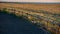 Wooden fence in the livestock feeding field, panoramic evening landscape