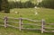 wooden fence long a mountain pasture in Val Gardena