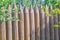 Wooden fence made of sharpened logs