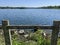 Wooden fence overlooking a lake