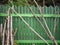 Wooden fence painted in green