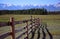 Wooden fence with pattern from a shadow in mountains