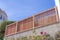 Wooden fence railings at the top of a concrete wall in San Francisco, California