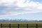 Wooden Fence with Rugged Mountains