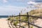 Wooden Fence on Sandy Pathway to Beach at Sandbridge