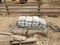 Wooden fence and stacks of old bags of cement