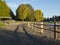 Wooden fences and beach front Blue lake park.