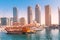 Wooden ferry boat cruise in Dubai Marina harbor. Tourist destinations in United Arab Emirates