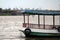 Wooden ferryboat on Chaophraya River. a boat for conveying passengers.