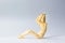 Wooden figure doll with sit up for health on white for exercise