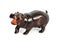 Wooden figure of a hippopotamus isolated on background