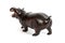 Wooden figure of a hippopotamus isolated on background