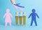 Wooden figures with bottles of alcohol on a blue background. Family Alcoholism Treatment Concept, chronic illness