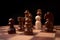 Wooden figures businessman standing confront of chess king and being in the chess circle. New business players are facing