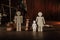 Wooden figures of family with child and gavel on a table. Divorce and alimony concept
