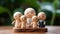 Wooden figures of family with smiley faces on wooden background