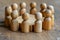 Wooden figures in a meeting or discussion, concept photo