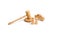 Wooden figurine of a car with people in a hammer of the judge on a white background. Minimalism. Purchase and sale of the car.