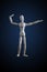 Wooden figurine flexing muscles in bodybuilder pose on dark back