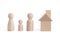 Wooden figurines family. Wooden figurines concept. model house on a white background. Real estate