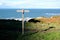 Wooden finger post marking coast path