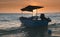 Wooden fishery boat floting on the sea