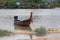 Wooden fishing boat ancient in river